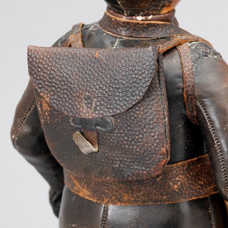 DOCKA, läder, 1800-tal.