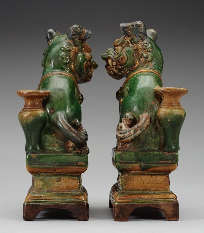 A pair of seated Buddhist lions, 17th Century.