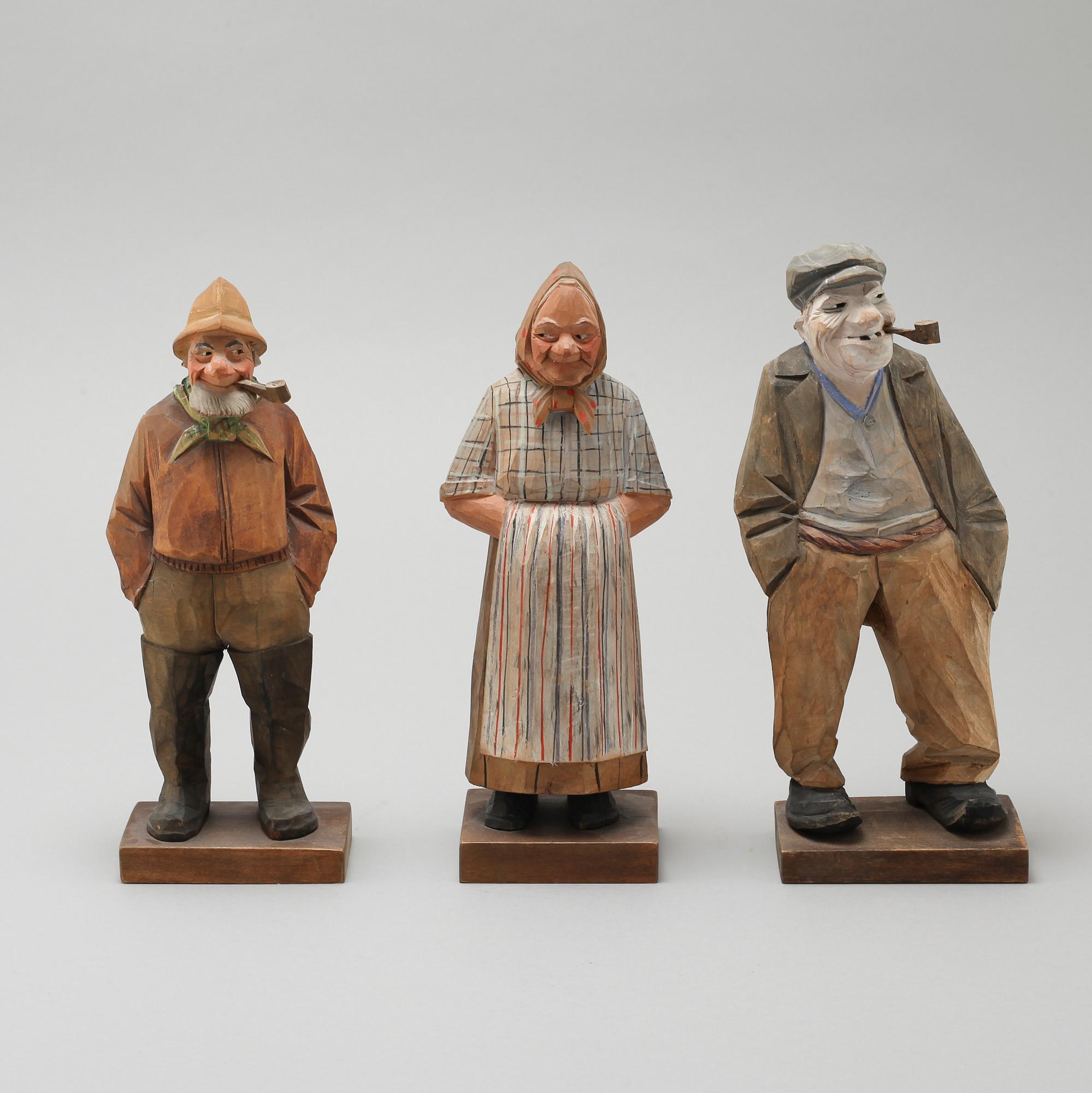and CARL JOHAN TRYGG, three wooden sculptures, signed and dated, 1940s.