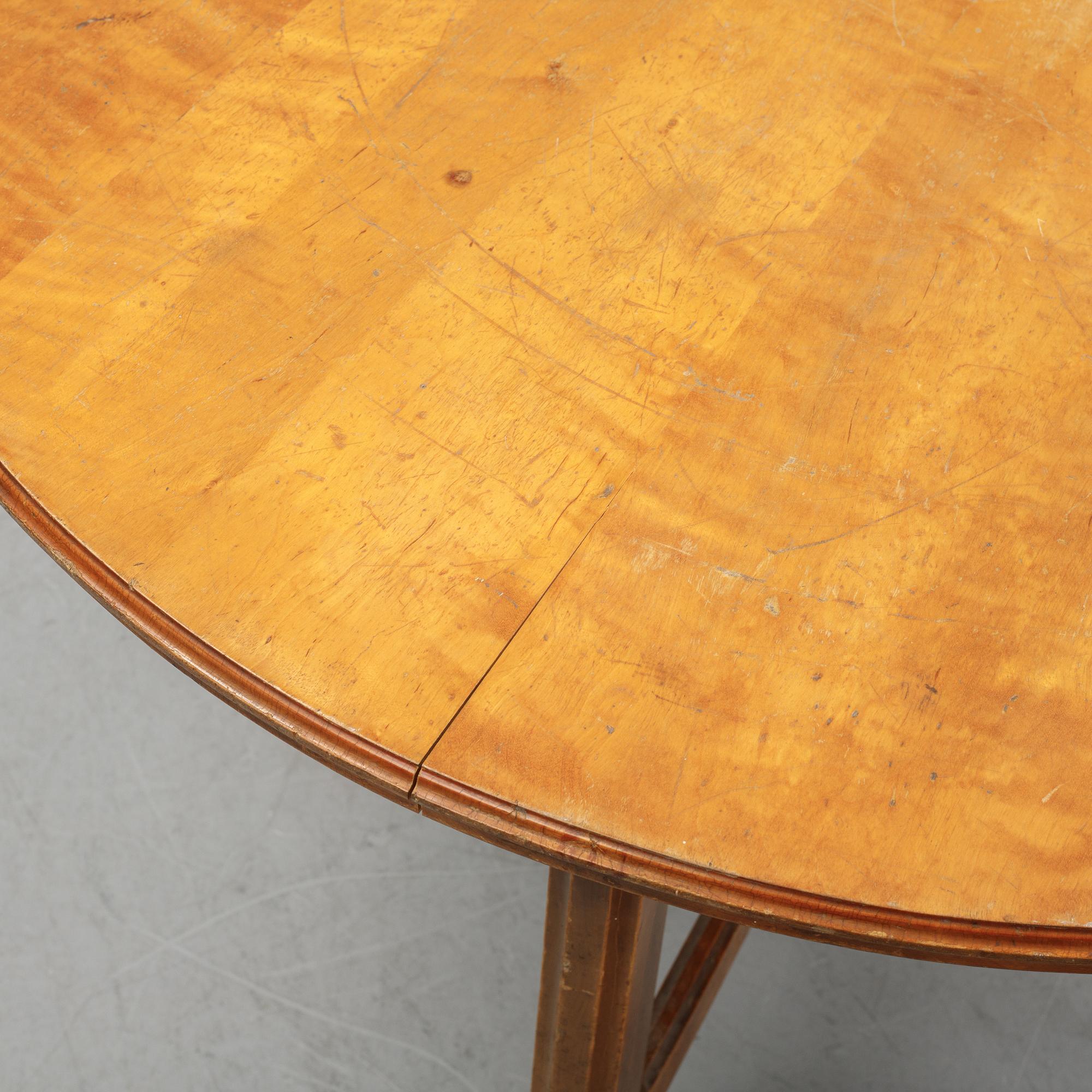 Nordiska Kompaniet, a birch Art Nouveau table, 1906.