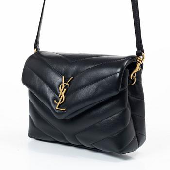 Yves Saint Laurent, a sholder bag.