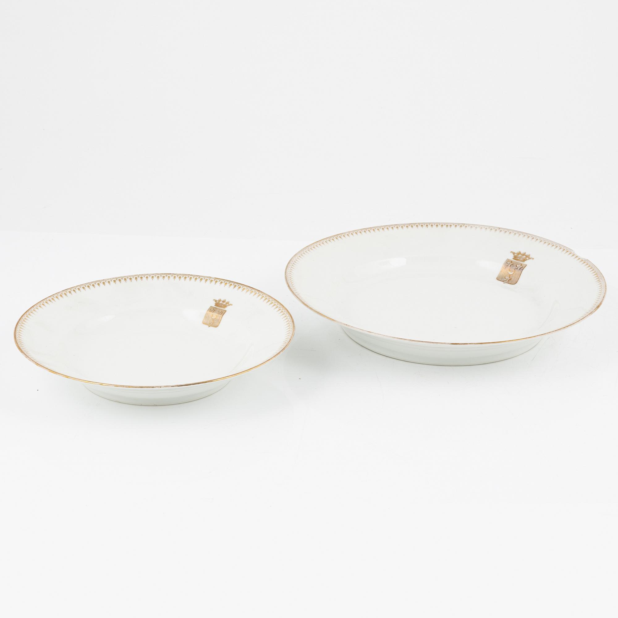 A 82 piece porcelin dinner service, France. With the Hamilton family coat of arms.