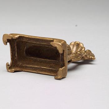 A copper alloy Jain shrine, western India, 19th Century or older. With inscription to the back.