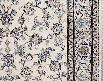 A part silk Nain carpet, ca 305 x 198 cm.