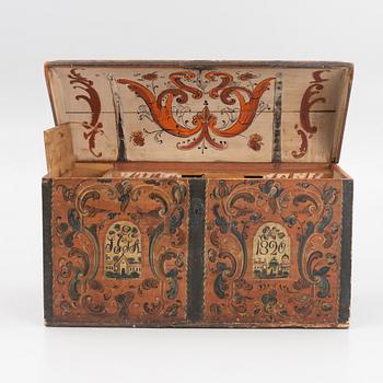 A wooden Dalecarlian chest, Sweden, dated 1820.
