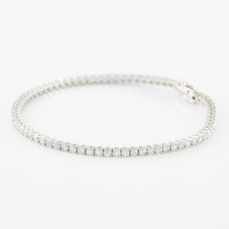 Tennisarmband 18K vitguld med åttkantslipade diamanter.