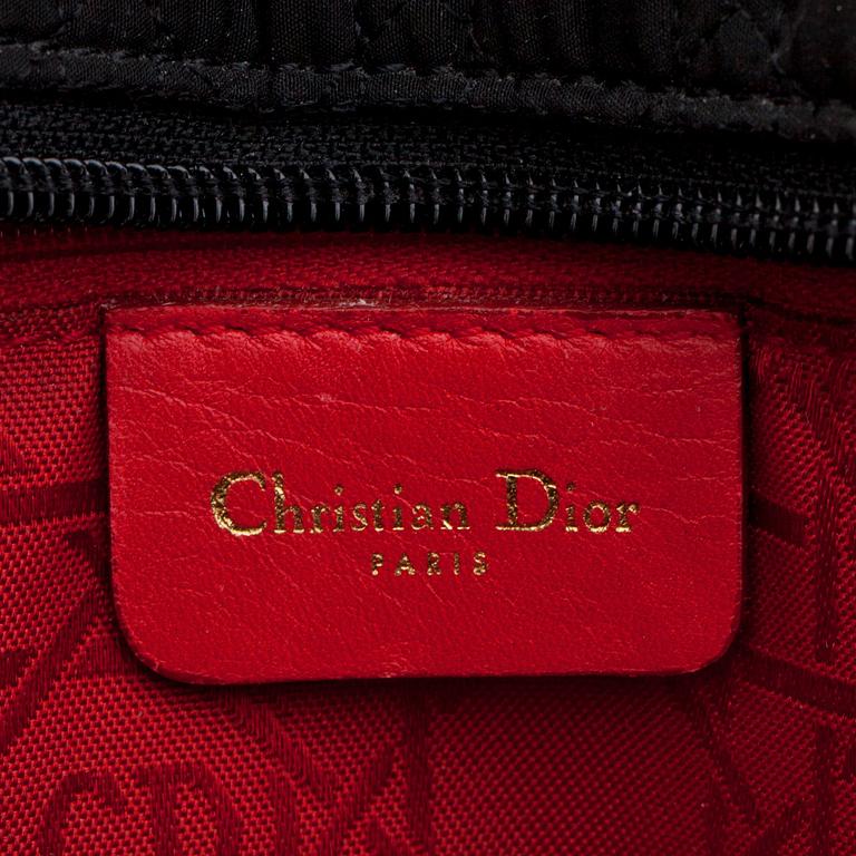 CHRISTIAN DIOR, a black silk blend handbag, "Lady Dior".