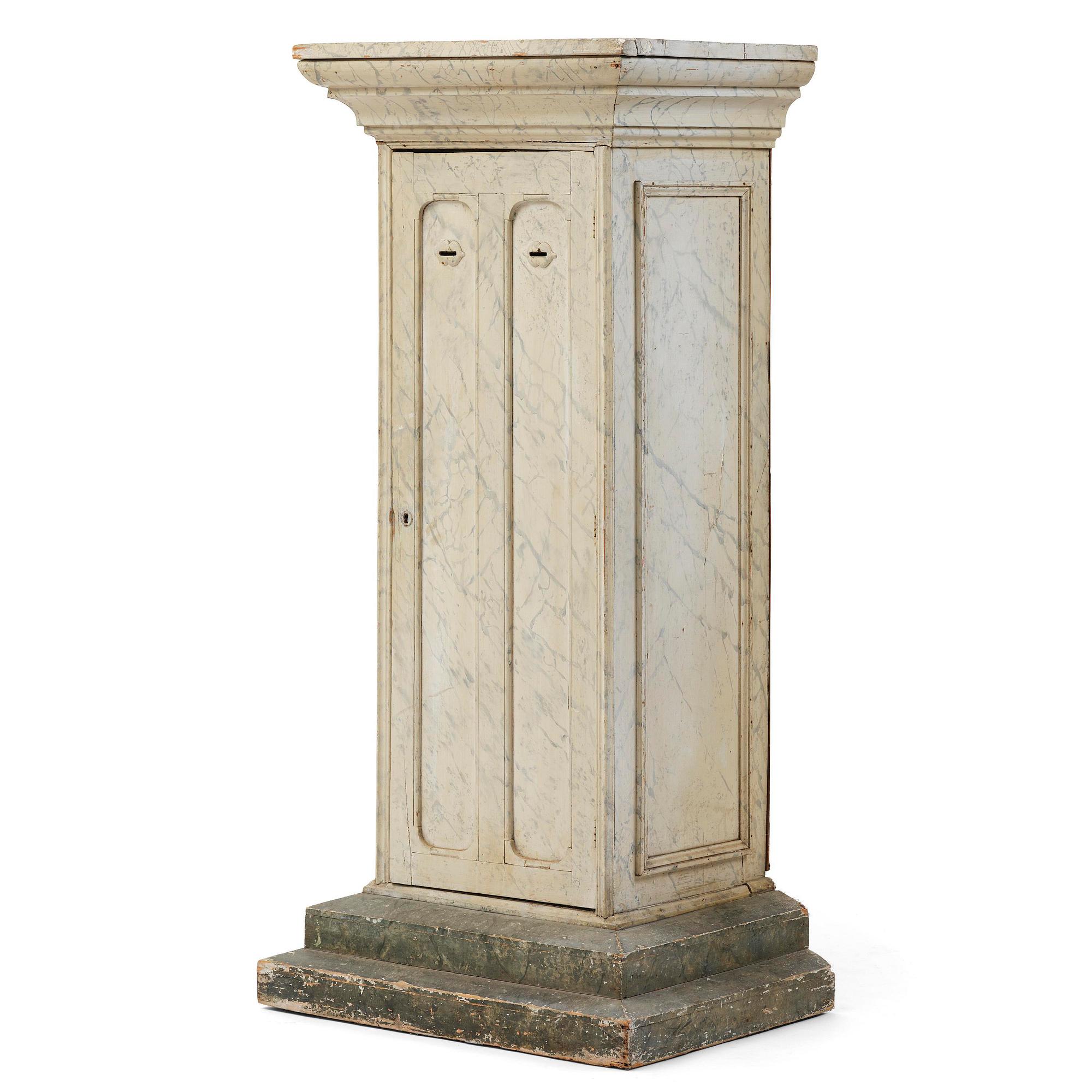 A Swedish column-shaped cabinet 19 th century.