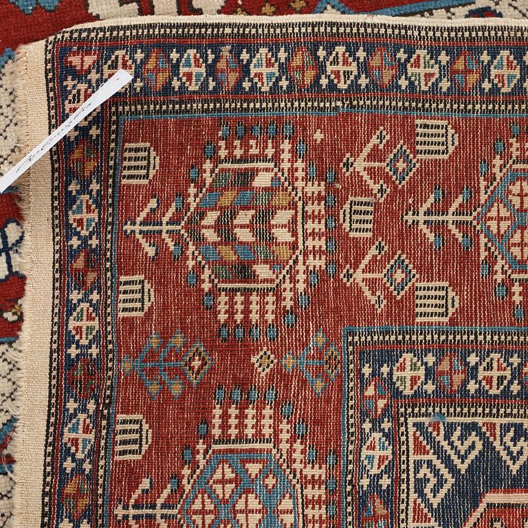 A CARPET, an antique/semi-antique Shirvan, ca 234 x 130 cm (as well as the ends with 1 cm flat weave).