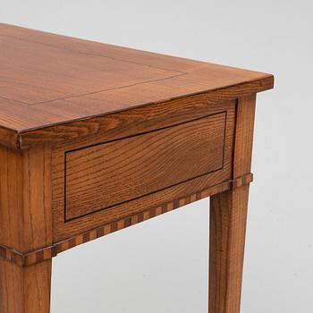 An elm wood veneered sewing table, early 19th Century.
