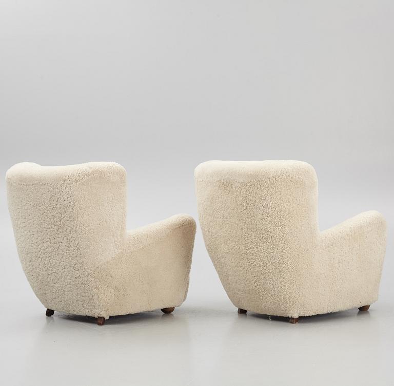 A pair of Danish Modern sheepskin armchairs, 1930's/40's.