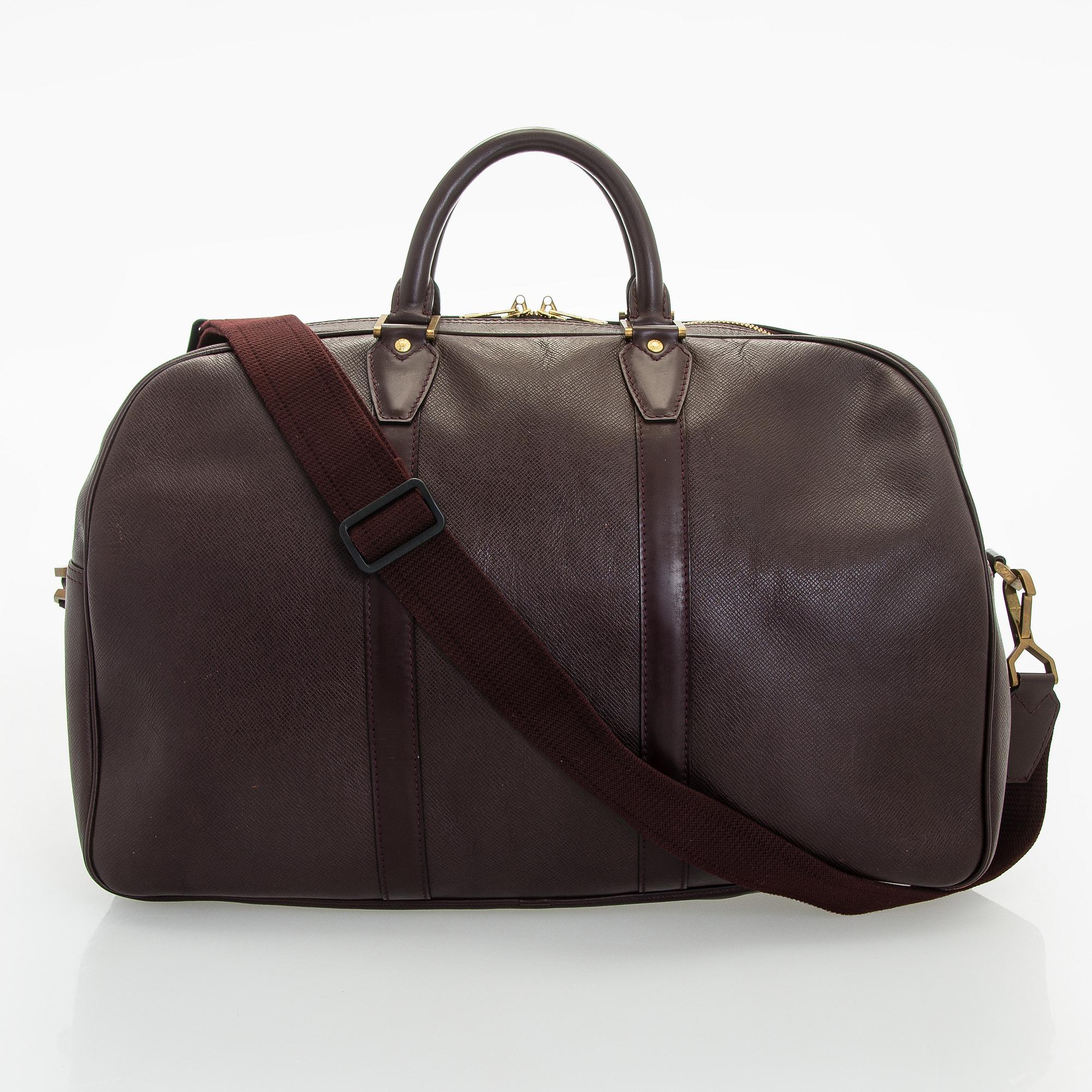 Louis Vuitton, a 'Taiga Kendall PM' weekend bag.