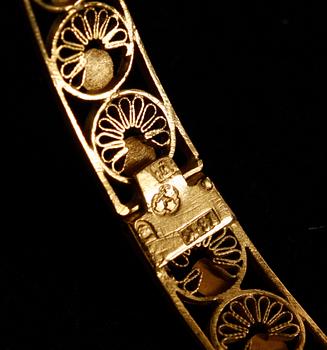 ARMRING, 18 k guld.