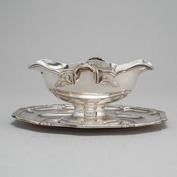 A French silver 950/1000 sauce-bowl and stand, unidentified makers mark, probably Paris after 1838. Louis XV-style.