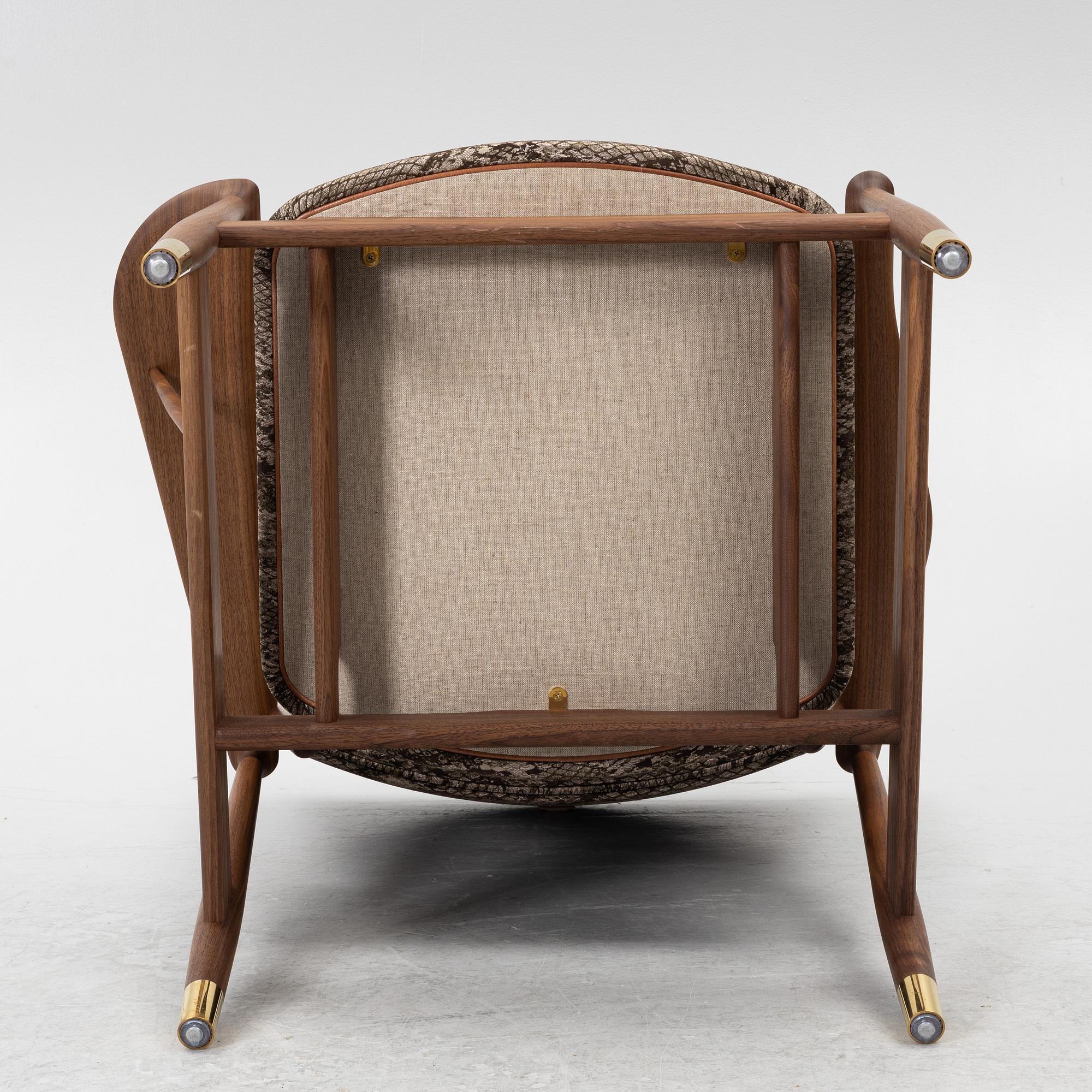 Finn Juhl, A 'Whisky chair', House of Finn Juhl, 21st century.