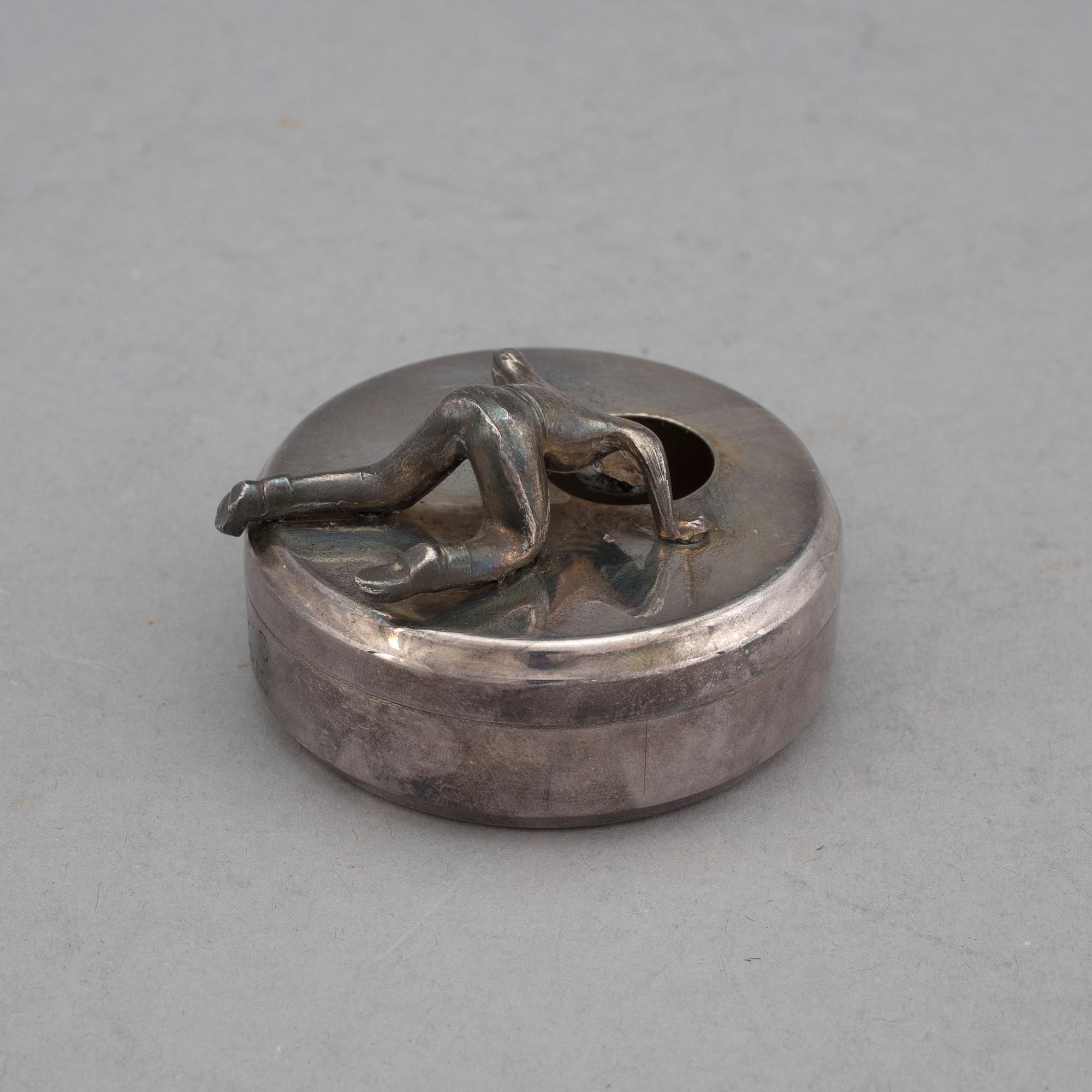 MANSCHETTKNAPPSASK, tenn och vitmetall, "Originell", Widerholm & Dahlberg, Eskilstuna, 1930-/40-tal.