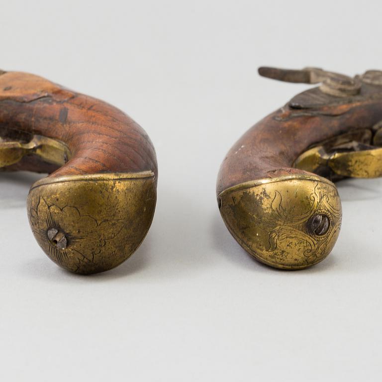 Two percussion lock pistols from around year 1800. Changed from flint lock to percussion lock.