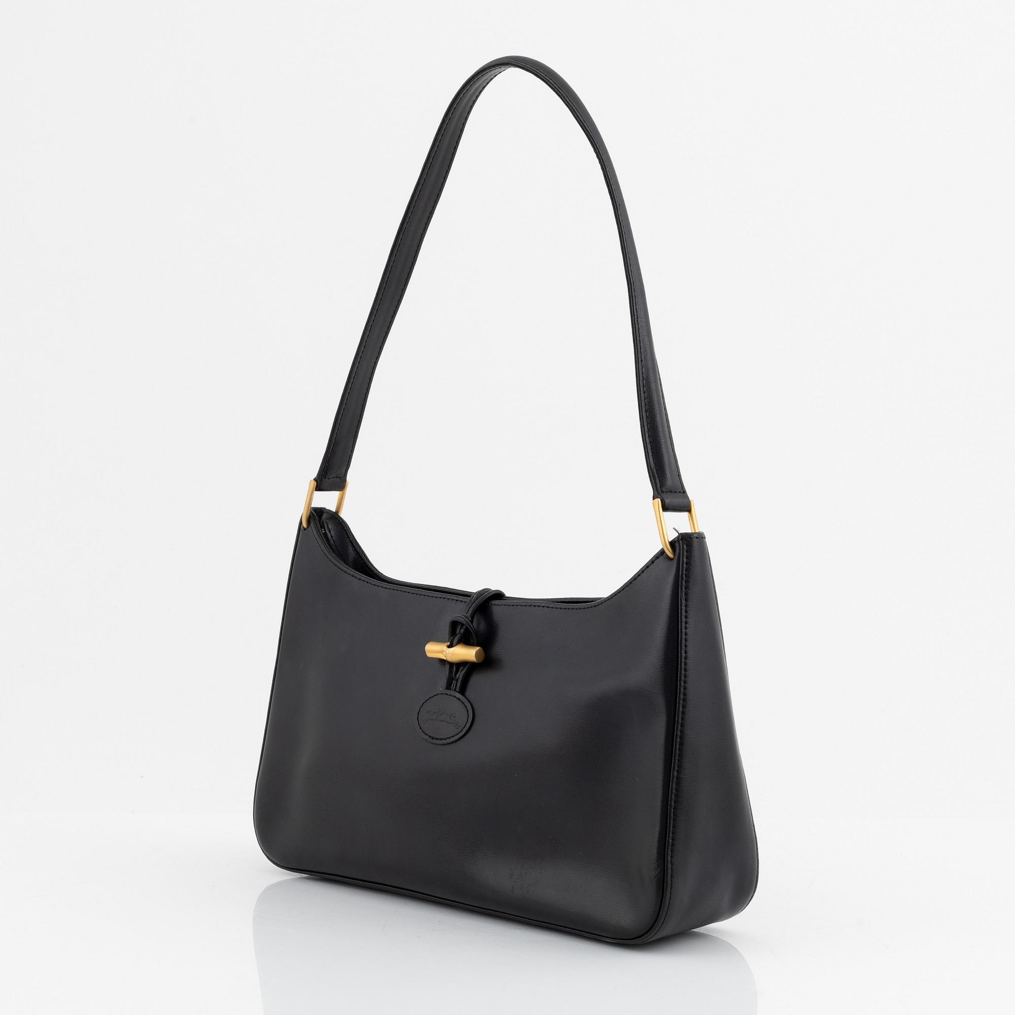 Longchamp, a leather bag.