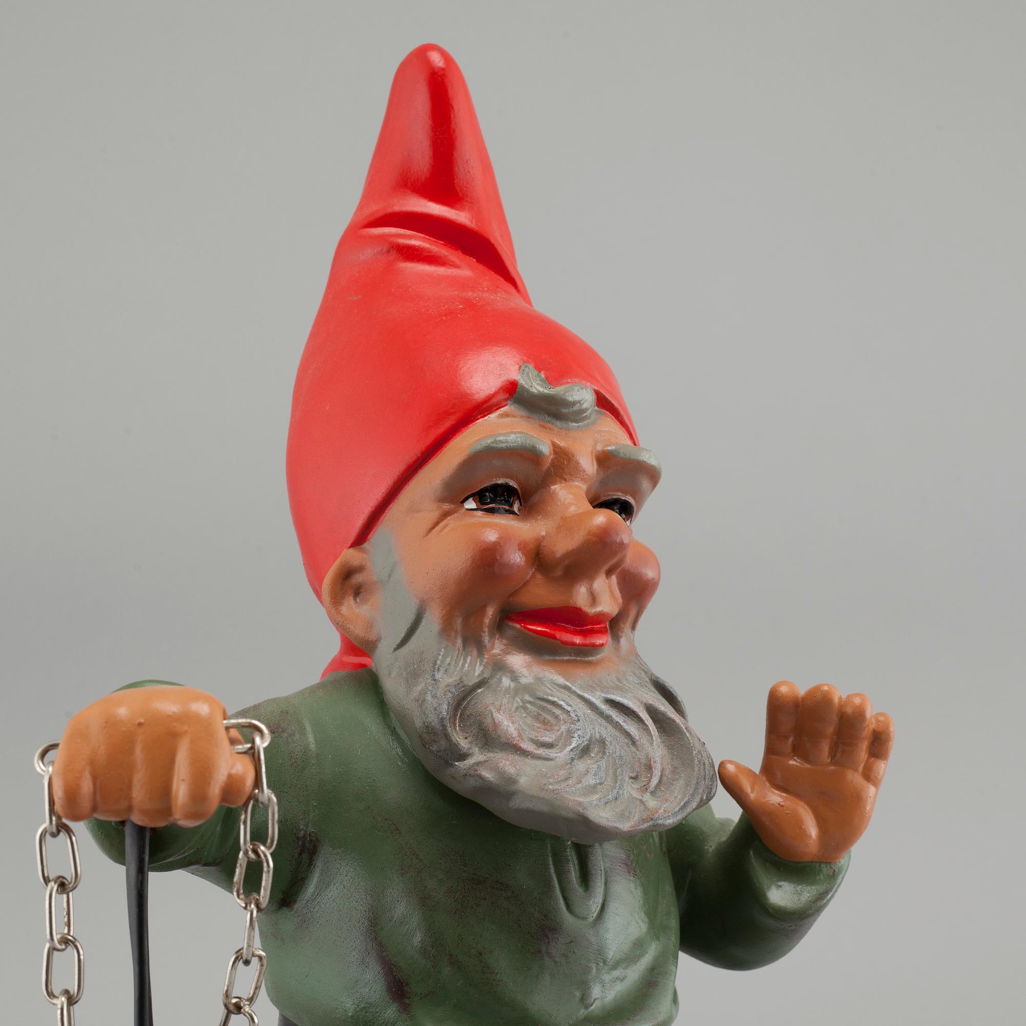 An earthenware gnome with lantern by Heissner, Germany from the second half of the 20th century.