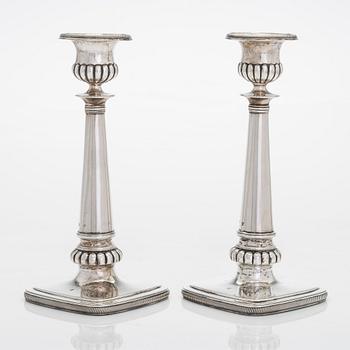 A pair of silver candlesticks, maker's mark of A. Homan, active in Amsterdam, 1817 – 1842.