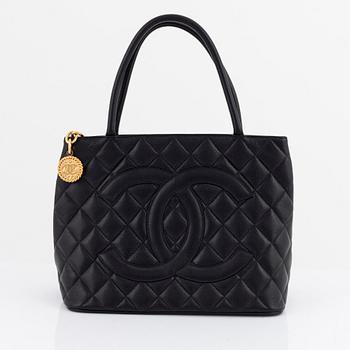 Chanel, a black caviar leather 'Medallion Tote' handbag, 1997-99