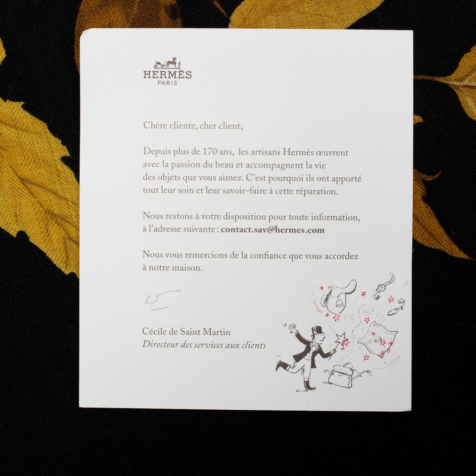 A Hermès cashmere and silk scarf "Tourbillon".