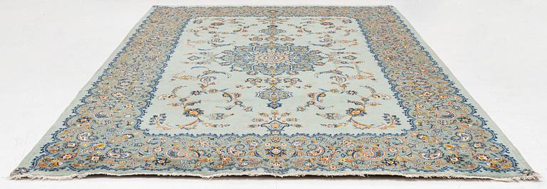 A Keshan carpet, signed, c. 376 x 270 cm.