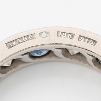 Ring, 18K white gold with sapphires and brilliant-cut diamonds.