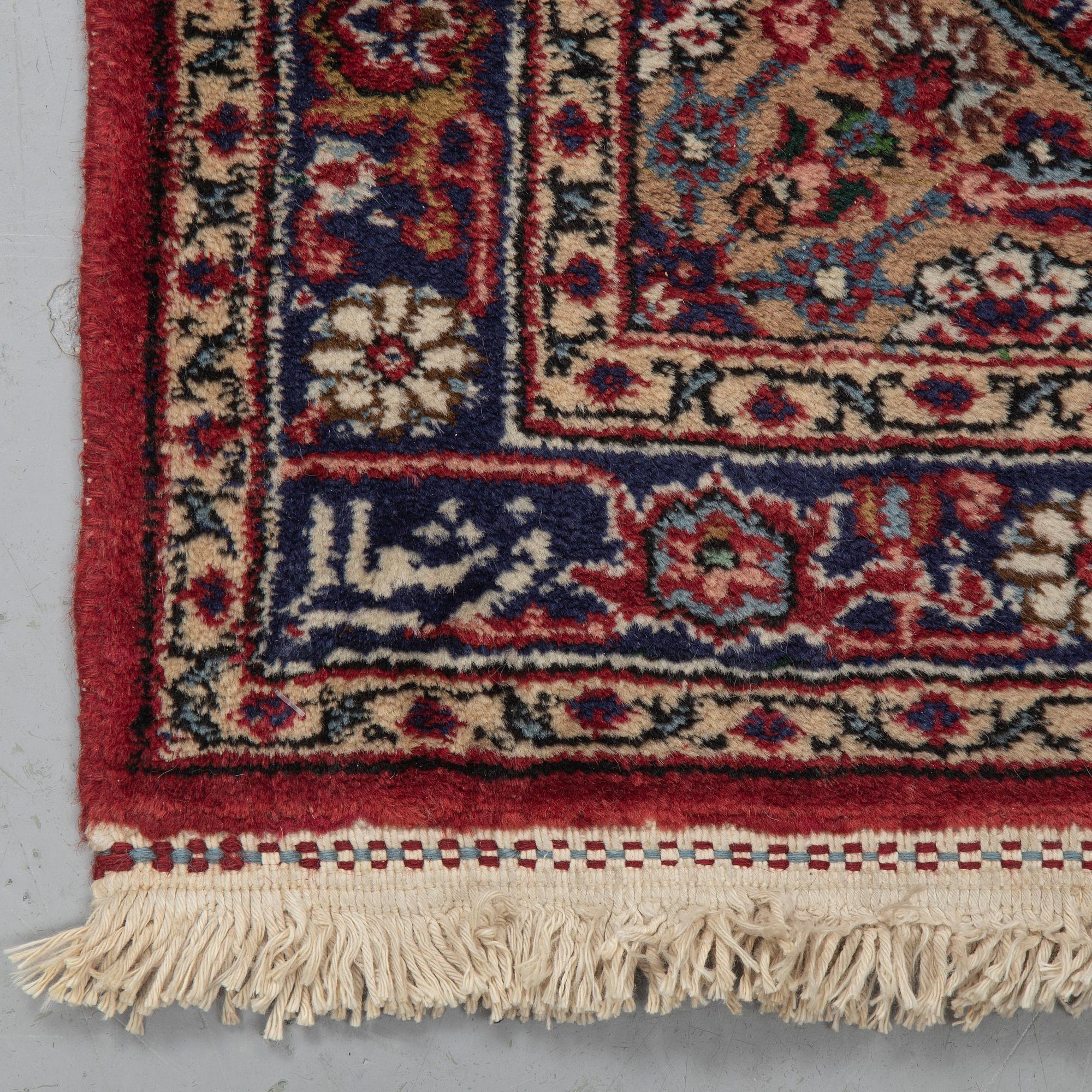 A runner, Tabriz probably, signed, ca 193 x 70 cm.