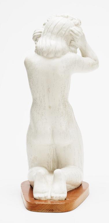 A Harald Salomon stoneware sculpture of a female in the nude, Rörstrand 1944.