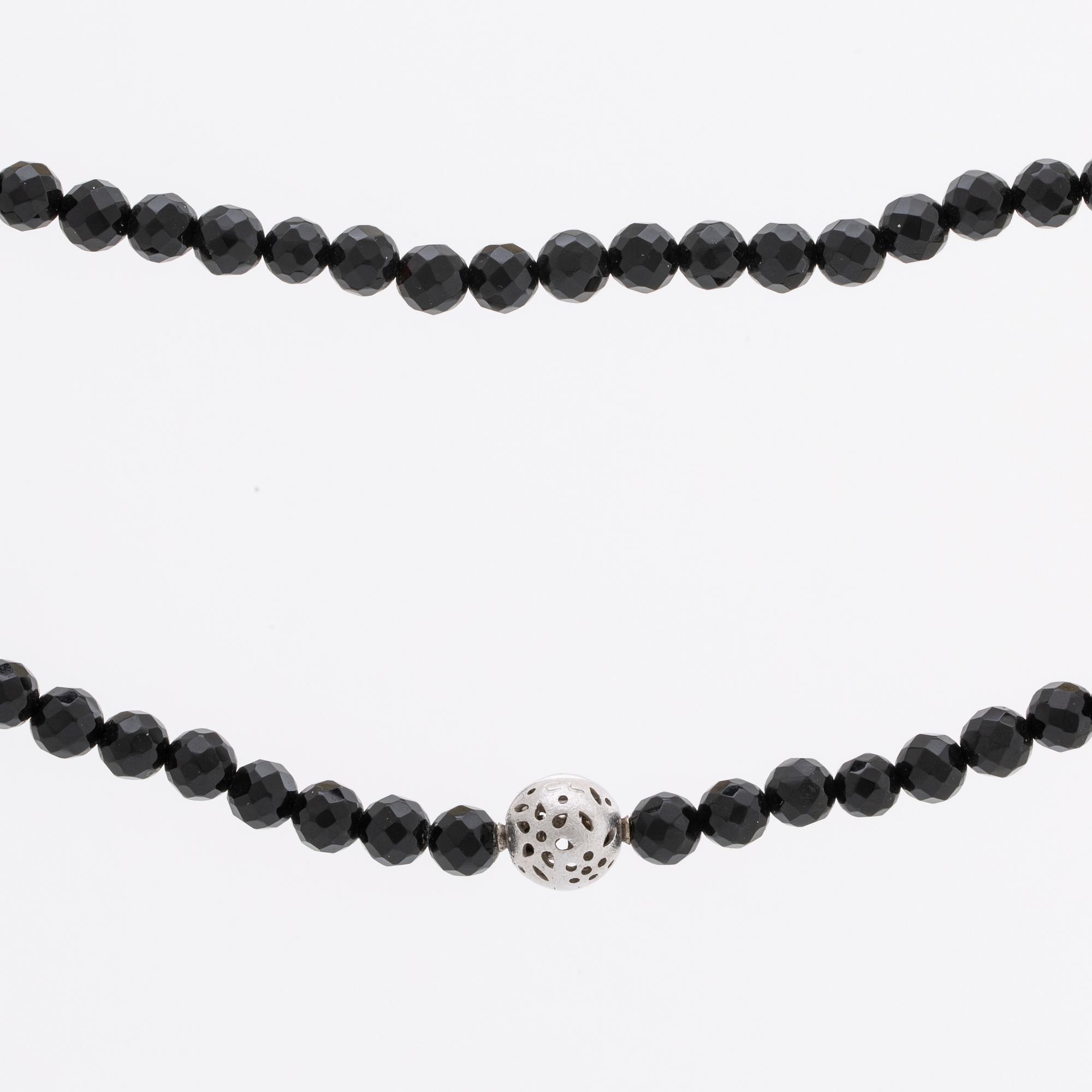OLE LYNGGAARD necklace, onyx beads approx 6 mm, clasp 18K whitegold approx 10 mm, CL 750 inscribed, original case.