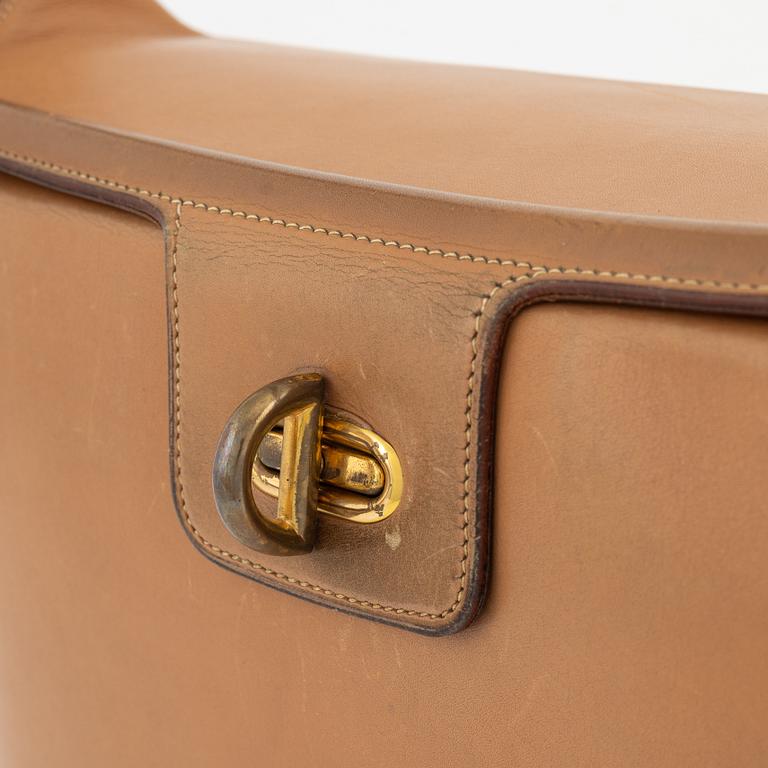 Hermès, a vintage tan leather bag, mid 20th century.