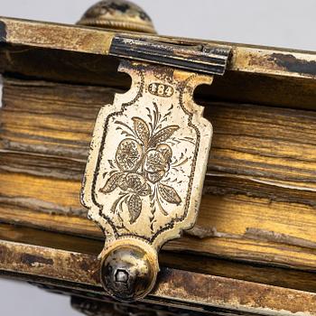 A Russian parcel-gilt silver book cover, mark of Sergei Vyerkovthyev, St. Petersburg 1873-1874.