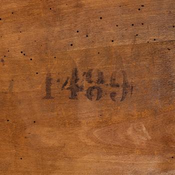 A mahogany veneered table, circa 1800.