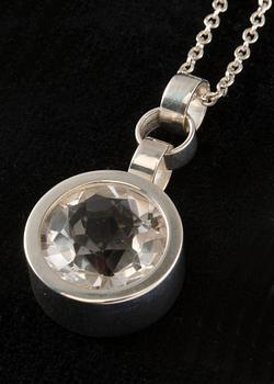 Elis Kauppi, A PENDANT AND A RING, silver with rock crystal, Kupittaan Kulta 1964. Weight 34 g.