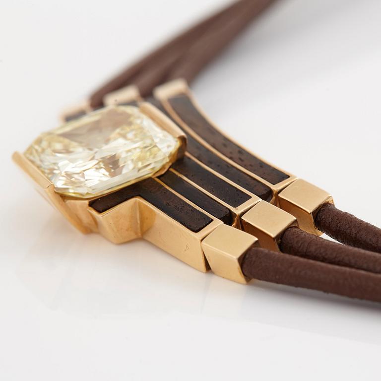 A Paul Binder necklace with a modified radiant-cut diamond ca 16 cts quality ca Fancy Light Yellow vs/si.