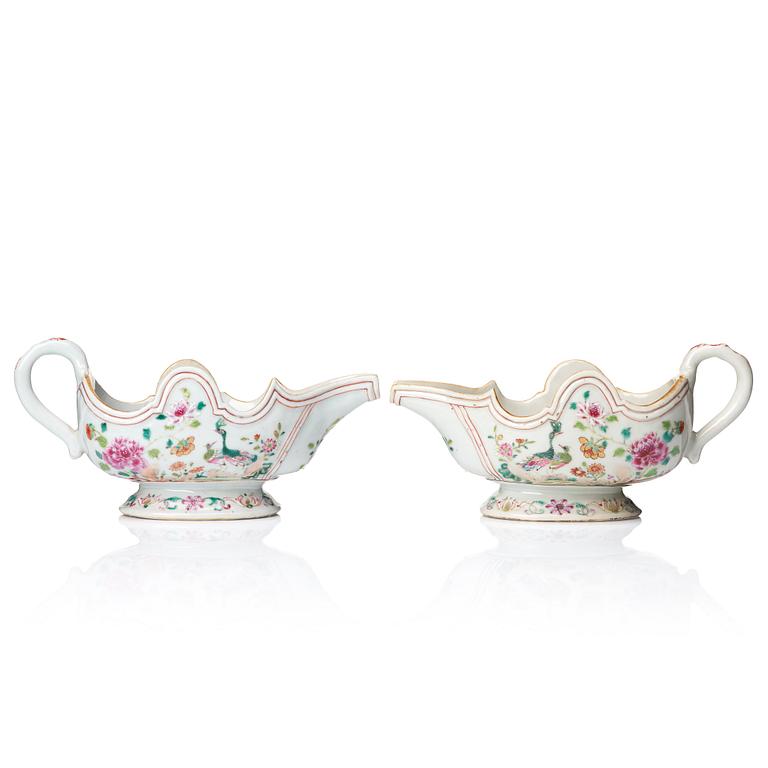 A pair of famille rose 'double peacock' sauce boats, Qing dynasty, Qianlong (1736-95).