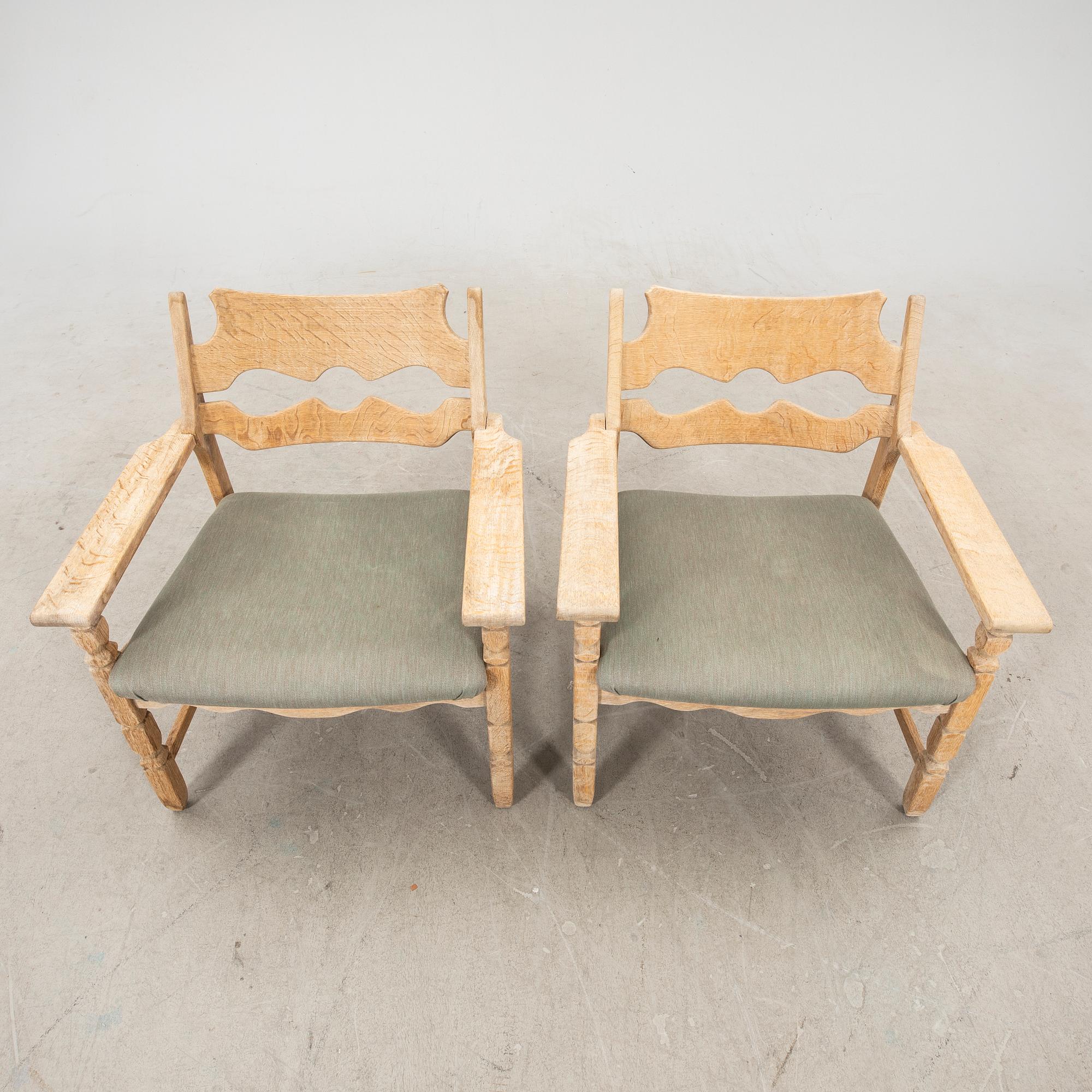 Henry (Henning) Kjaernulf, pair of arm chairs Nyrup furniture factory, Denmark, mid 20th century.