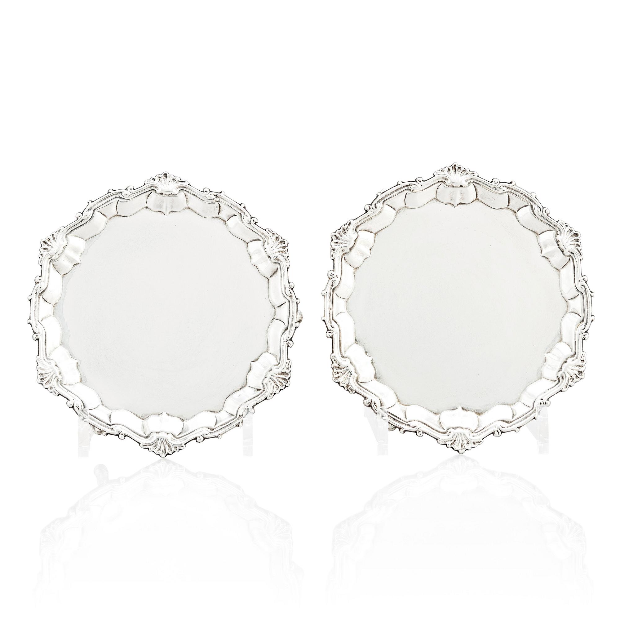 A pair of English silver salvers/plates, marks of Thomas Cooke II and Richard Gurney, London 1753.
