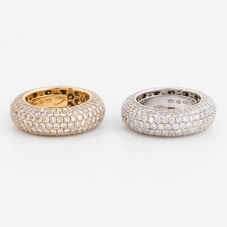 Two brilliant-cut diamond rings.