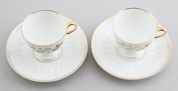 KAFFEKOPPAR, 11 st med 10 fat, porslin, sannolikt Tyskland, 1900-talets första hälft.