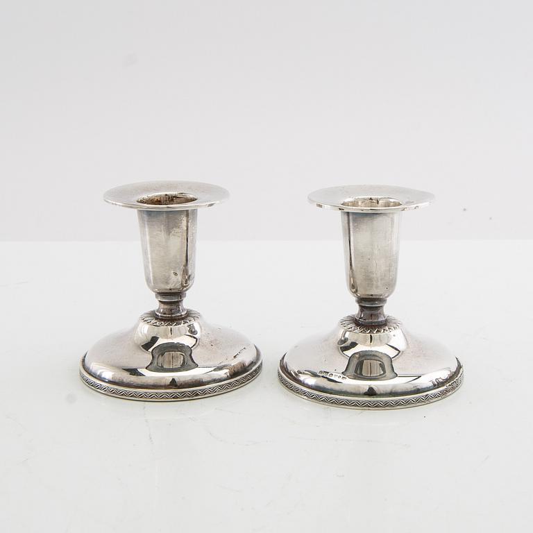 Ljusstakar 2 par silver MGAB Uppsala 1960 samt K&EC Göteborg 1964.