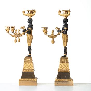 A pair of Empire three-light candelabra, circa 1810.