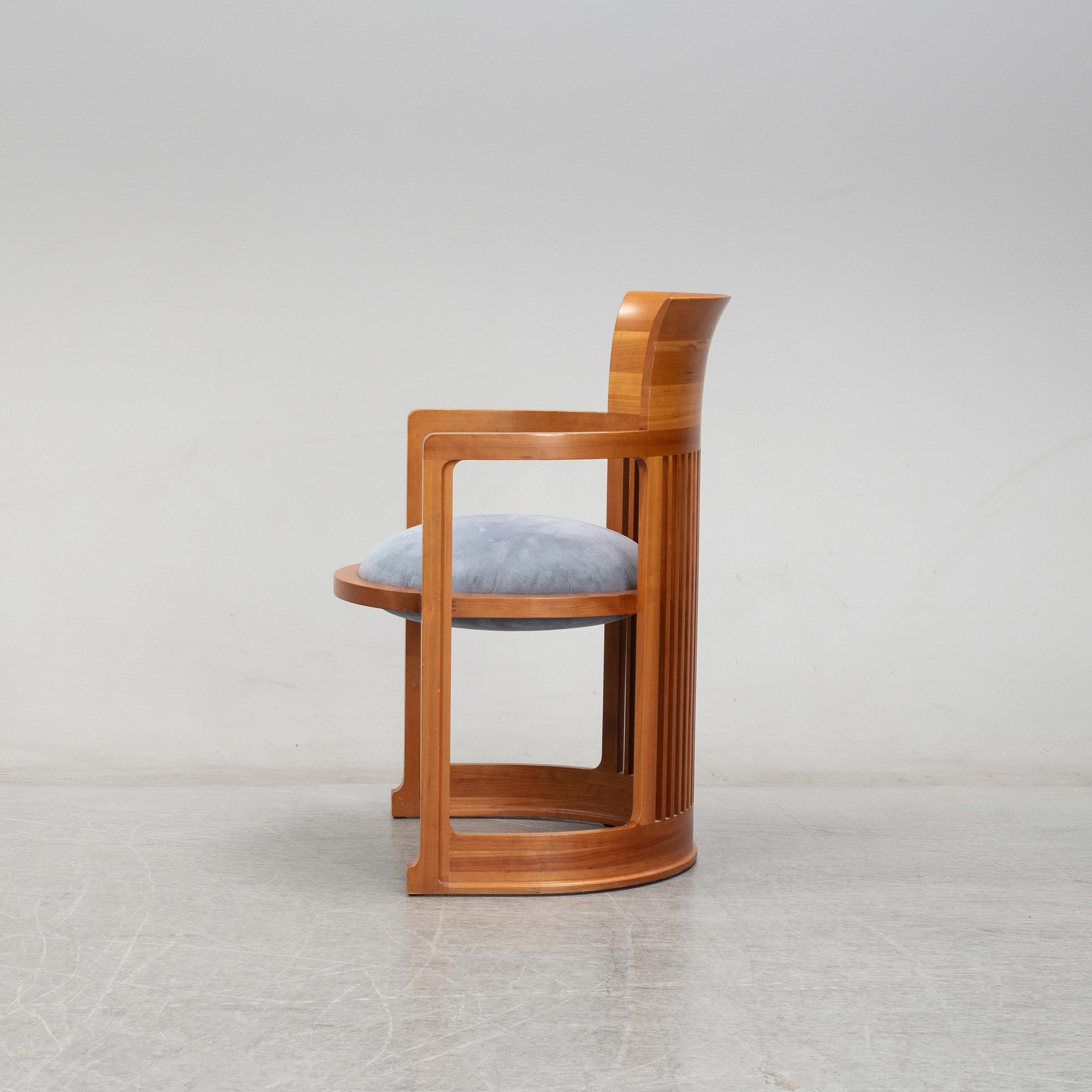 A model 606 'Barrel' chair by Frank Lloyd Wright for Cassina, designed 1937.