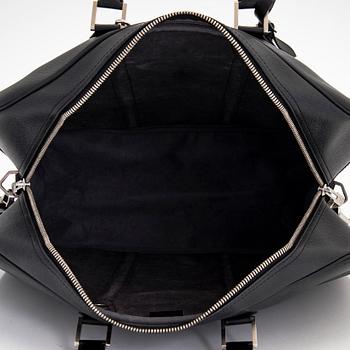 Louis Vuitton, a 'Taiga Kendall PM' weekend bag.