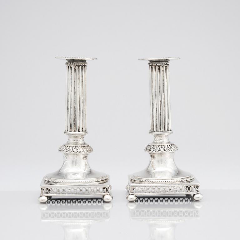 A pair of Swedish Gustavian silver candlesticks, mark of Mikael Nyberg, Stockholm 1795.