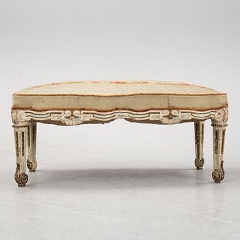 A Louis XVI-style bench, late 19th century.