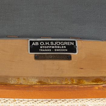 A pair of easy chairs by Carl Malmsten for OH Sjögren, Second half of the 20th Century.