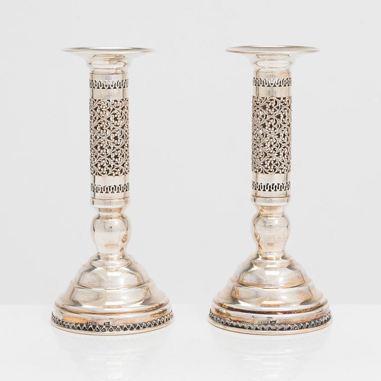 A pair of sterling silver candlesticks, latter half of the 20th century. Unidentified maker's mark.