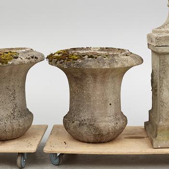 Garden urns, a pair on pedestals, 20th century.